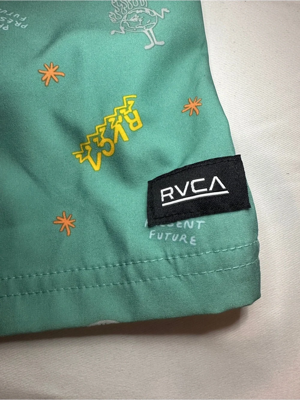 RVCA boys Teal Patterned Swim Trunks size 10/12